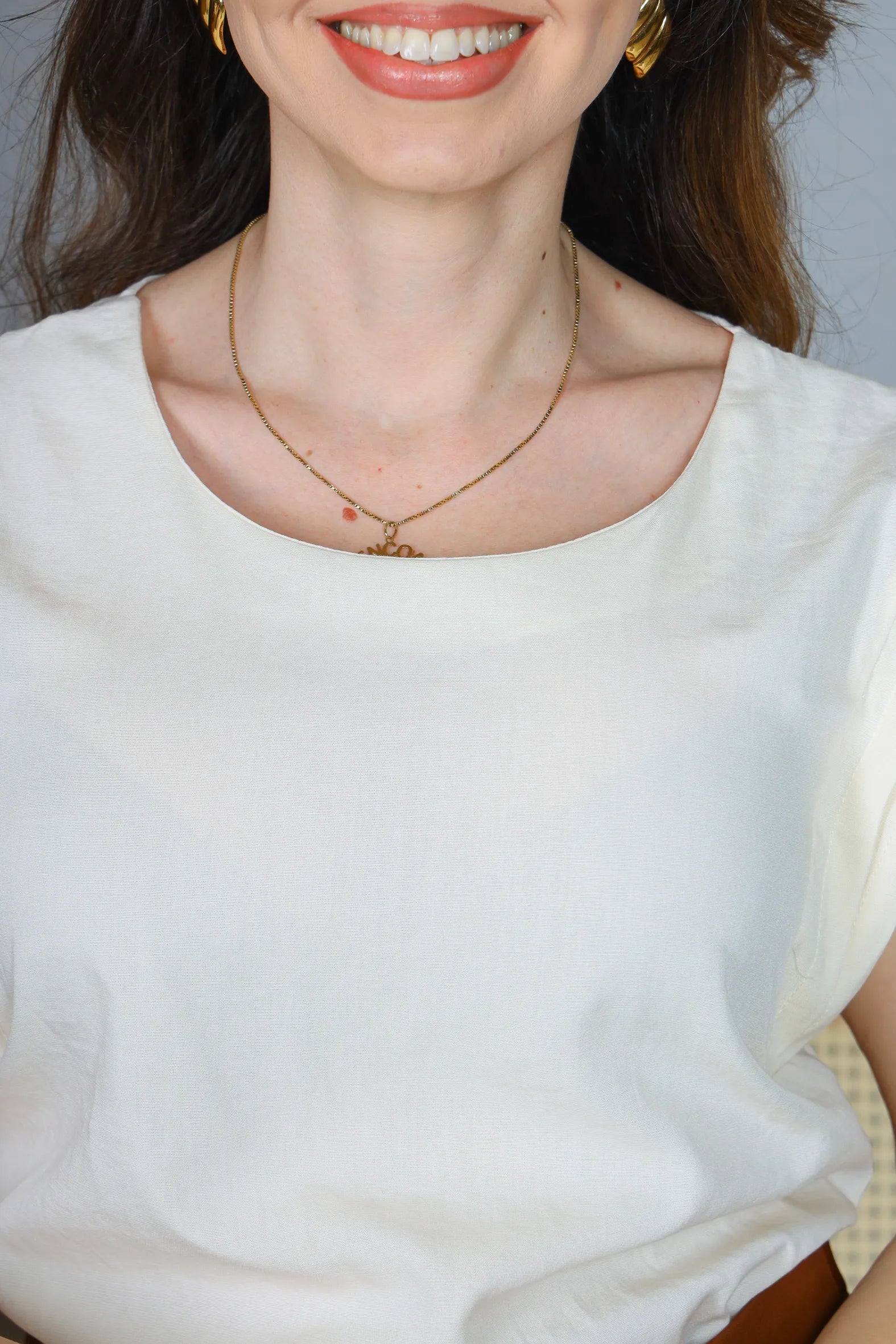 Blusa Regata Muscle Tee em Cotton Mix Detalhe Cava Dobrada Diana Creme